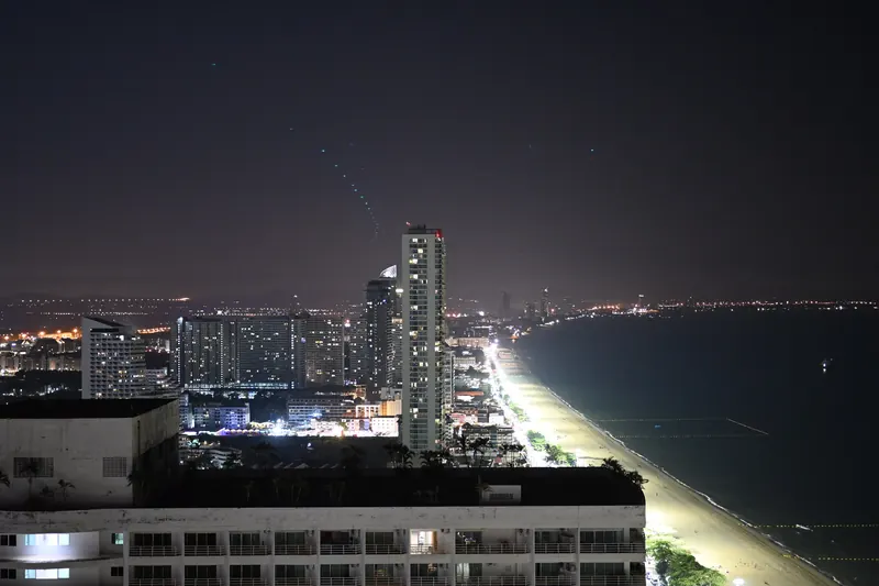 Pattaya bay and city lights at night